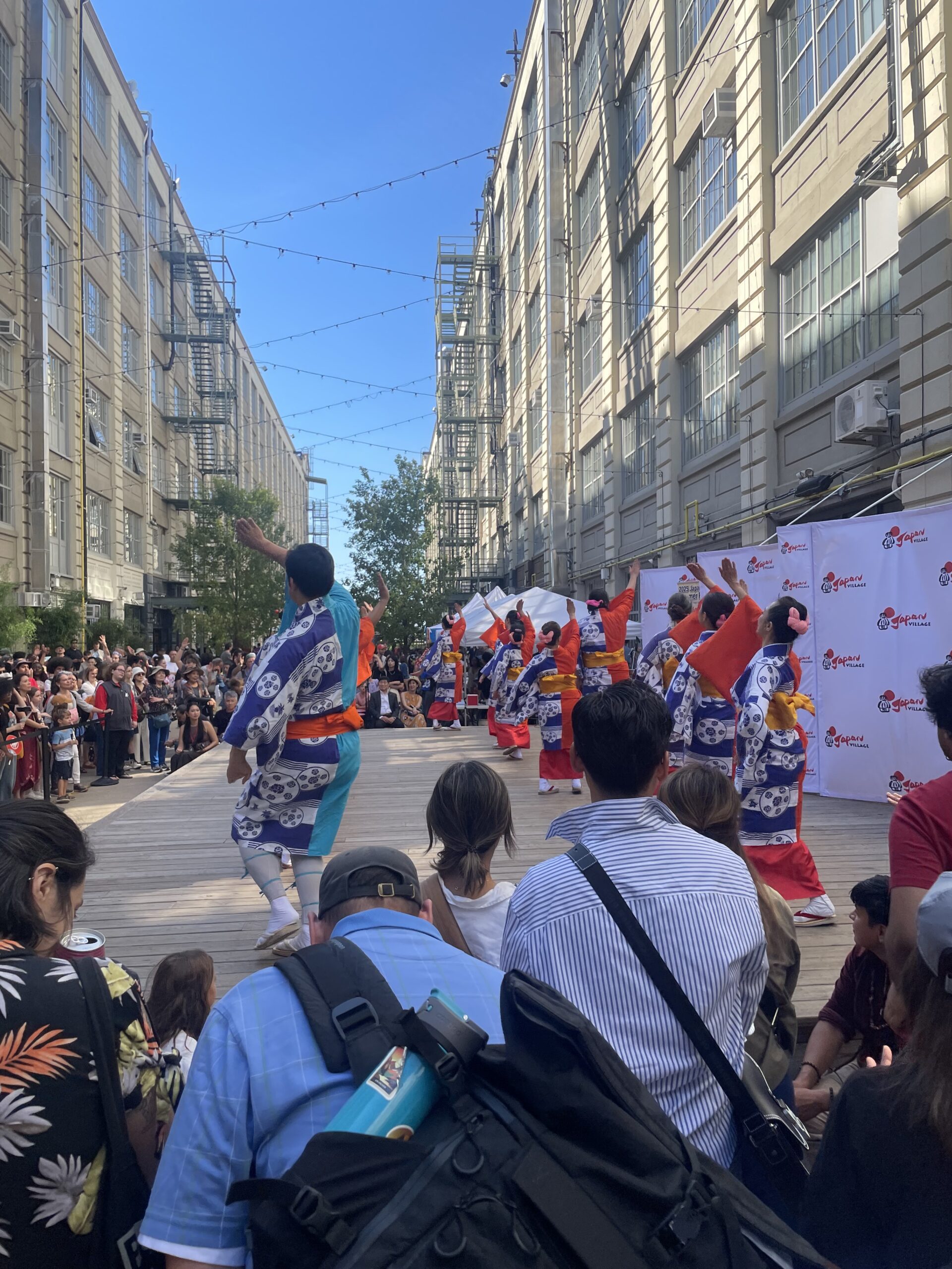 A photograph of dancers from the Japan Village Summer Festival