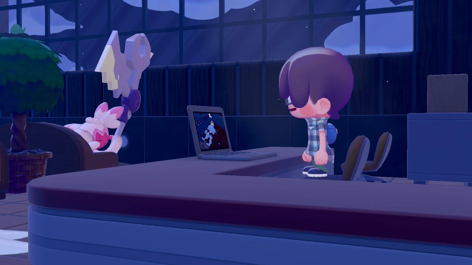 Ditto John watches Machoke on a laptop.
