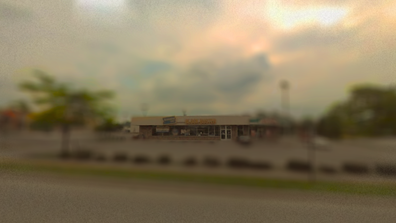 An image of a Blockbuster. It has been Iris blurred around the edges as if it is difficult to remember.